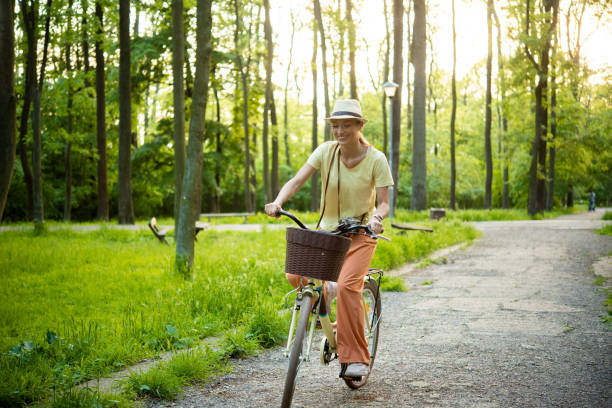 istock Young woman is relaxing in nature 1812239305