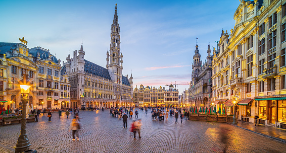 Grand Place in old town Brussels, Belgium city skyline at sunset