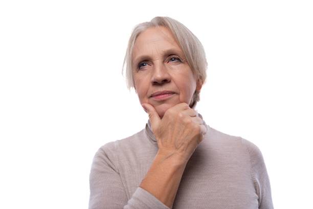 istock Grandmother with gray hair thinking on a white background 1812242427