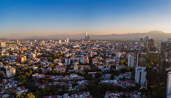 Skyline at sunset at sunset, aerial view del Valle neighborhood and office buildings along Insurgentes Avenue