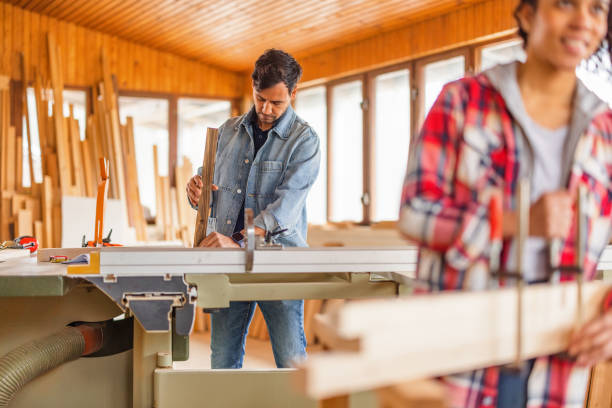 istock Two Young Carpenters Working Together At A Carpentry 1812252615