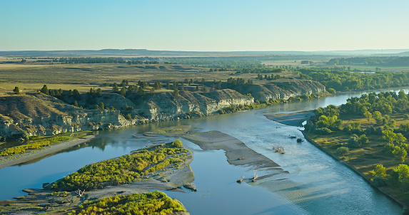 Aerial view of Yellowstone River near Custer, a village in Yellowstone County, Montana, on a clear day in Fall.