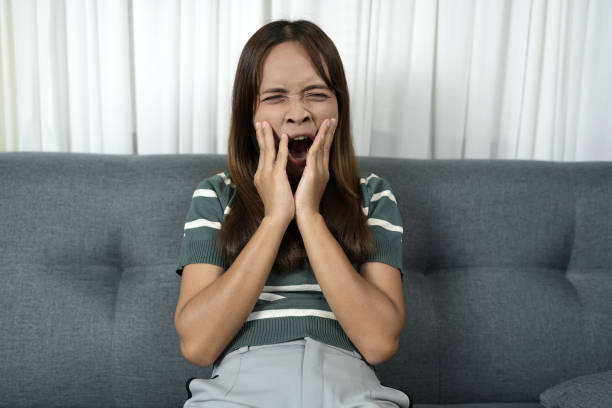 istock Asian woman has toothache from tooth decay 1812259274