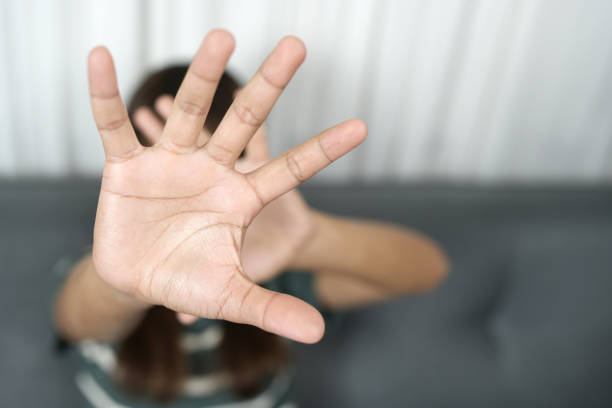istock Young Asian woman with a stop gesture. 1812259912