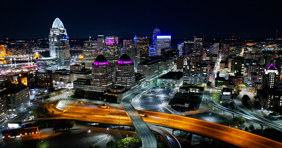 Aerial still image of the Interstate 71 passing the Central Business District on a clear, Fall night in Cincinnati, Ohio. Authorization was obtained from the FAA for this operation in restricted airspace.