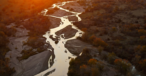 Aerial still image of the South Platte River in Brule, Nebraska, taken by a drone at sunset.