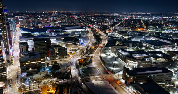istock Speer Boulevard on a Snowy Night in Denver- Aerial 1812317360