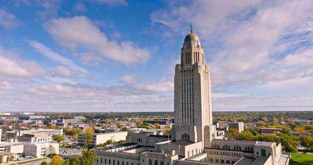 istock Nebraska State Capitol Tower under Cloudy Sky - Aerial 1812322005