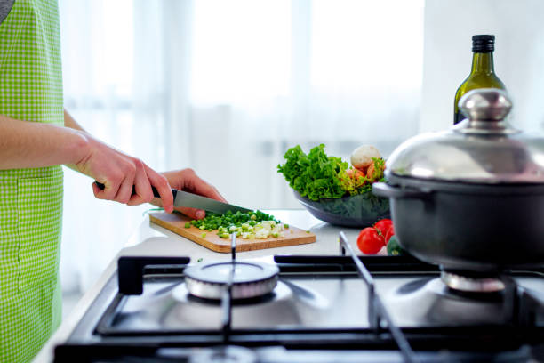 istock Chopped vegetables on chopping board for vegetables dishes and fresh salads at kitchen at home. Cooking preparation for dinner. Clean healthy food and proper nutrition. Diet 1812340828