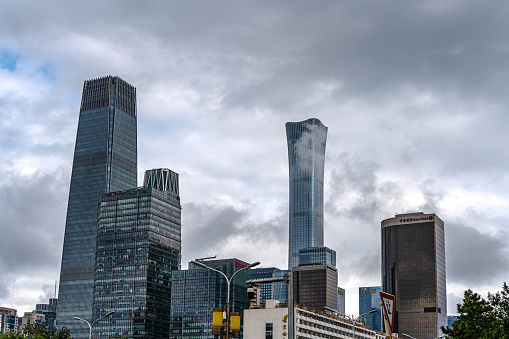 Clouds pass through the buildings on a rainy day in Beijing CBD