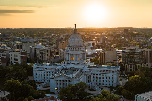 Aerial view of Wisconsin State Capitol building in downtown Madison, the capital city of Wisconsin, at sunset in Fall.\n\nAuthorization was obtained from the FAA for this operation in restricted airspace.