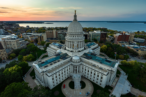 Aerial view of Wisconsin State Capitol building in downtown Madison, the capital city of Wisconsin, at sunset in Fall.\n\nAuthorization was obtained from the FAA for this operation in restricted airspace.