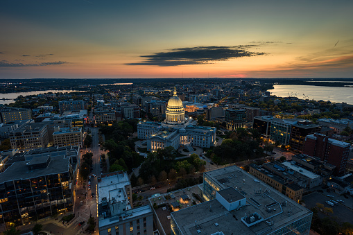 Aerial view of Wisconsin State Capitol building in downtown Madison, the capital city of Wisconsin, at sunset in Fall.

Authorization was obtained from the FAA for this operation in restricted airspace.