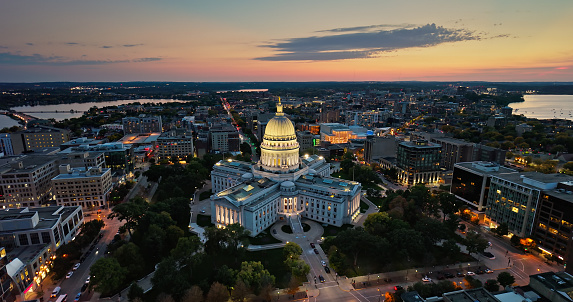 Aerial view of the Wisconsin State Capitol building in downtown Madison, the capital city of Wisconsin, at sunset in Fall.\n\nAuthorization was obtained from the FAA for this operation in restricted airspace.