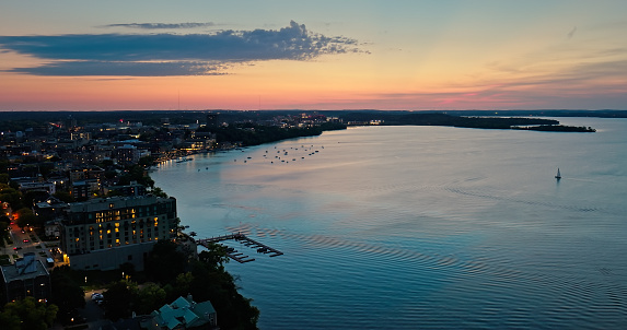 Aerial view of Lake Mendota in Madison, the capital city of Wisconsin, at sunset in Fall.

Authorization was obtained from the FAA for this operation in restricted airspace.