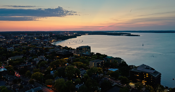 Aerial view of Lake Mendota in Madison, the capital city of Wisconsin, at dusk in Fall.\n\nAuthorization was obtained from the FAA for this operation in restricted airspace.