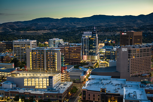 Aerial shot of downtown Boise, Idaho just before sunrise. \n\nAuthorization was obtained from the FAA for this operation in restricted airspace.
