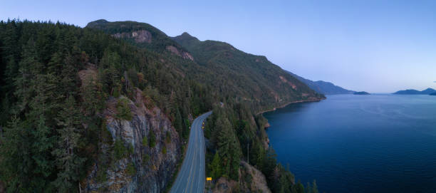 istock Sea to Sky Highway on Pacific Ocean West Coast. Aerial Panorama. 1812400607