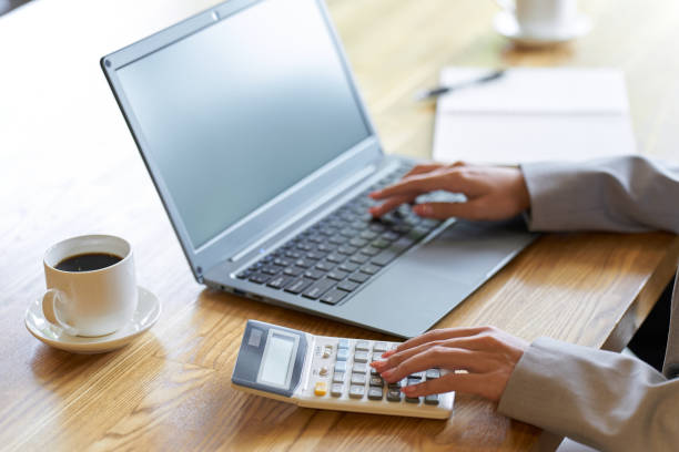 istock Business woman checking with a calculator 1812438881