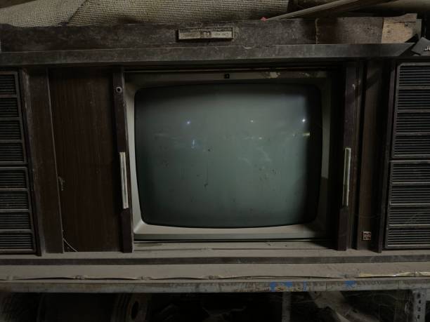 istock Old school and dusty television 1812558259