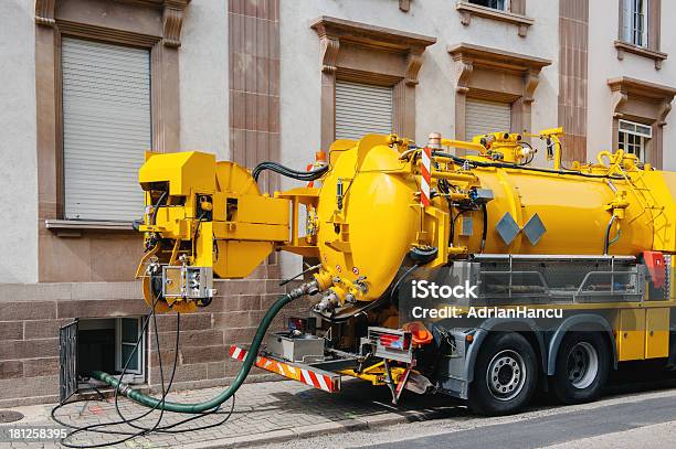 Sewerage Truck On Street Working Stock Photo - Download Image Now - Lubrication, Cleaning, Trapped