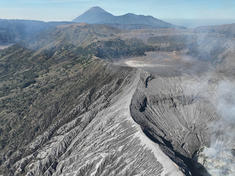 Aerial view Mountains at Bromo volcano during sunny sky,Beautiful Mountains Penanjakan in Bromo Tengger Semeru National Park,East Java,Indonesia.Nature landscape background