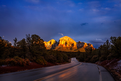 Red rock in Sedona illuminated by the setting sun.