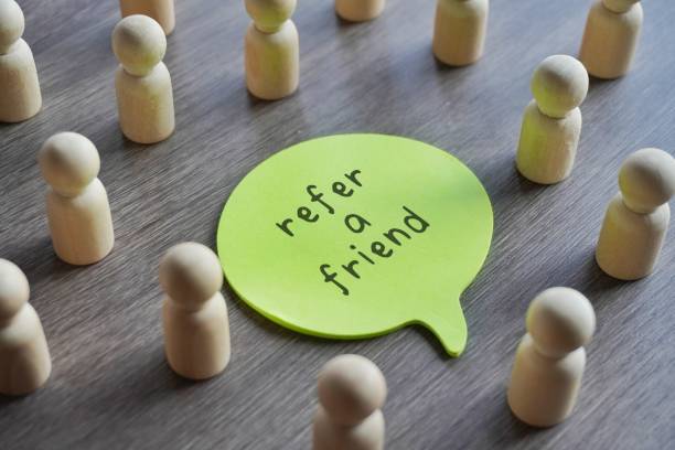 istock Closeup image of speech bubble with text REFER A FRIEND. 1812622380