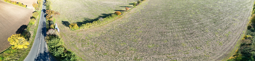 Aerial Ultra Wide Panoramic View of Countryside Landscape and Agricultural Farms of Letchworth Garden City of England UK. The Footage Captured with Drone's Camera on November 11th, 2023