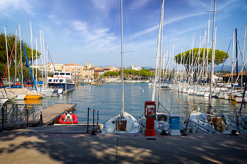 Holidays in Italy -  gas station in the marina in centre of Desenzano del Garda, Lombardy