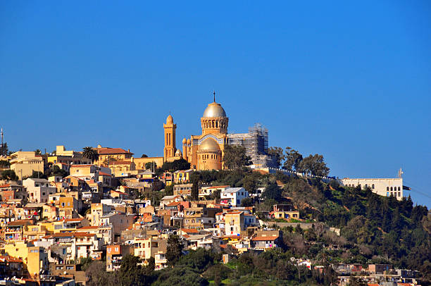 Algiers: Our Lady of Africa basilica, hill above Bologhine area Algiers, Algeria: Our Lady of Africa Catholic basilica, built on the hill above the Bologhine area - designed by Jean Eugene Fromageau, diocesan architect of Algiers - Byzantine style - French colonial architecture  algeria stock pictures, royalty-free photos & images