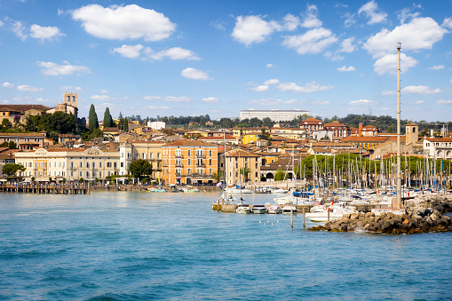Holidays in Italy -  scenic view of the marina and historical and tourists town of Desenzano del Garda at Garda lake