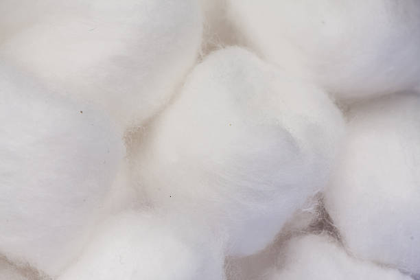 istock Pile of white cotton balls 181282046