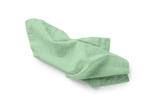 Green linen napkin isolated on white background