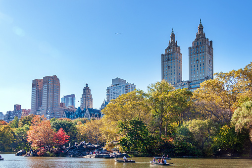 Autumn Day by the Lake in Central Park with San Remo Building in the Background - Manhattan, New York City