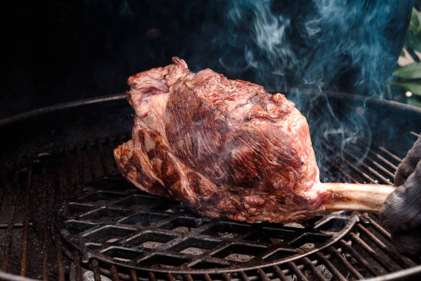 istock Riesiges Tomahawk Steak am Grill - huge Tomahawk Steak on the grill 1812872237