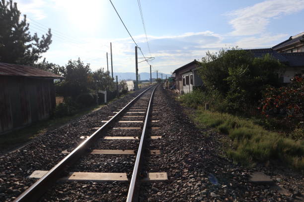 istock Architectural Building with Empty Road and Railway Track in Nature 1812873977
