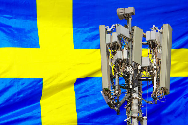 istock 5G network antenna base station on background Sweden flag. 6G network antenna base station on telecom tower emitting signal 1812894193