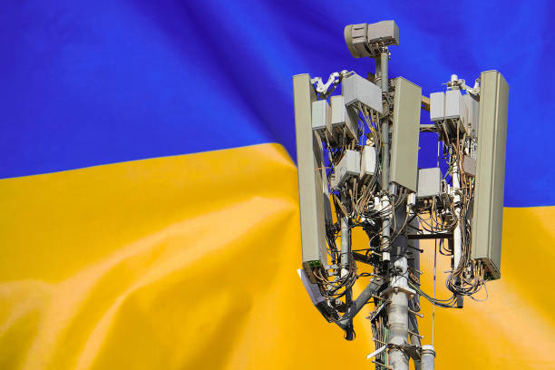 istock 5G network antenna base station on background Ukraine flag. 6G network antenna base station on telecom tower emitting signal 1812894716