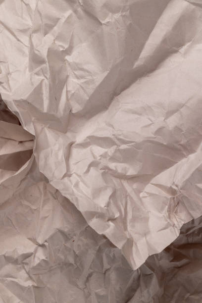 istock gray low-quality crumpled paper from recycled waste paper 1812904928
