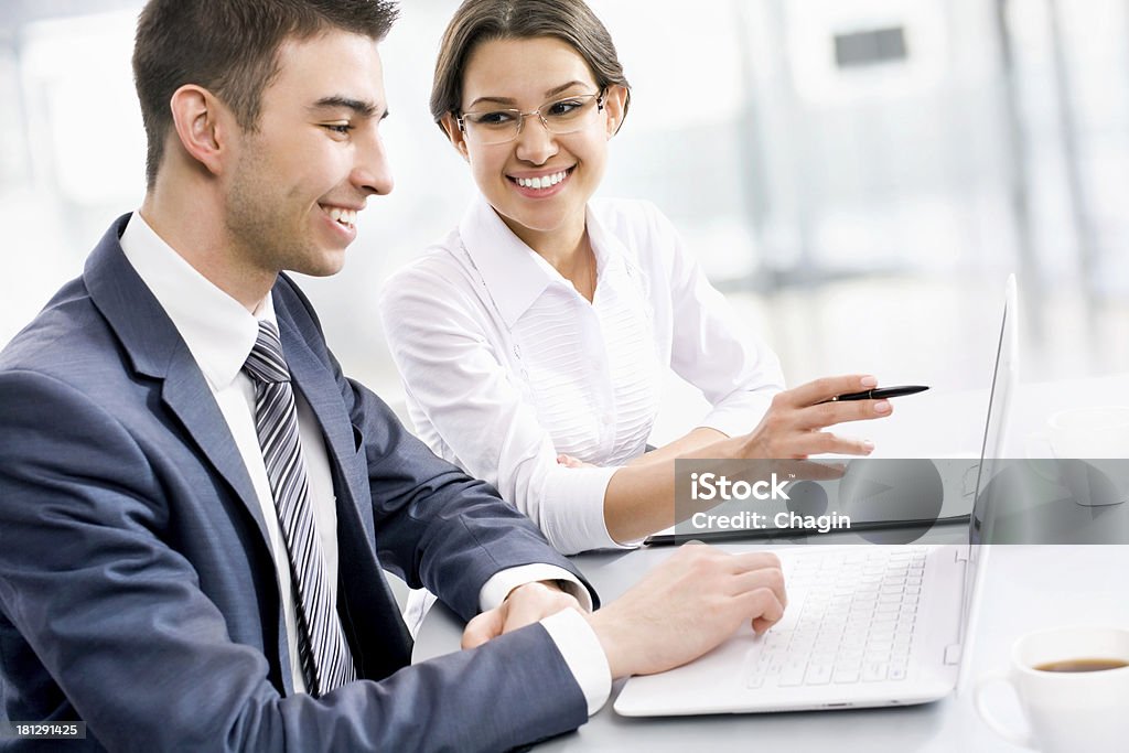 Business people Young business people working together at office Adult Stock Photo