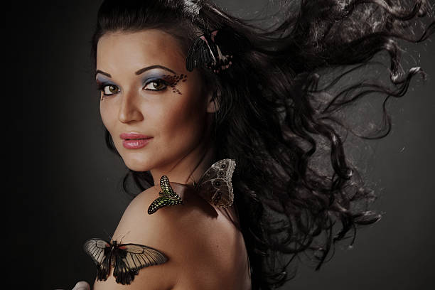 istock woman and butterfly 181293272