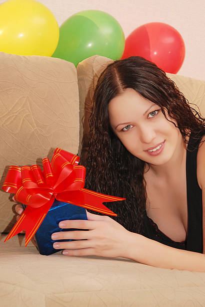 istock woman with presents 181294005