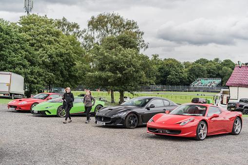 Tarporley, Cheshire, England, July 30th 2023. Ferrari 458, Maserati Gran Turismo and Lamborghini Huracan Performante at a supercar meet.