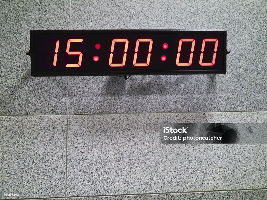 Digital clock Digital clock on gray patterned wall Digital Clock Stock Photo