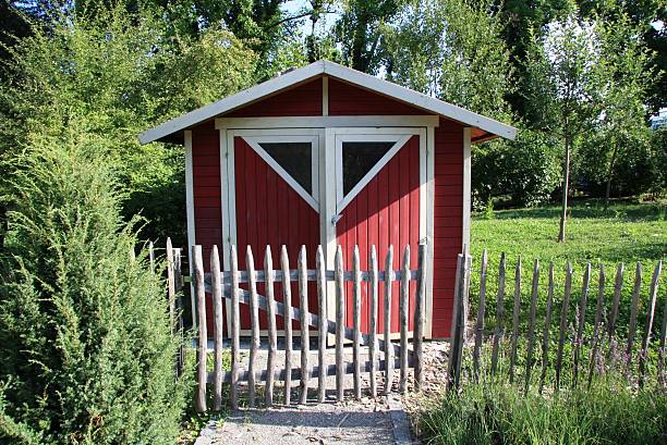 red garden shed stock photo