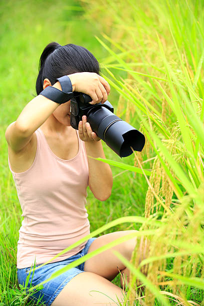 istock woman photographer outdoor 181306270