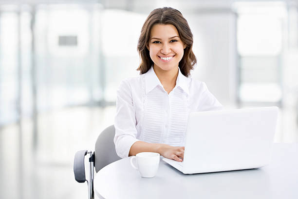 istock Business woman with laptop 181307133
