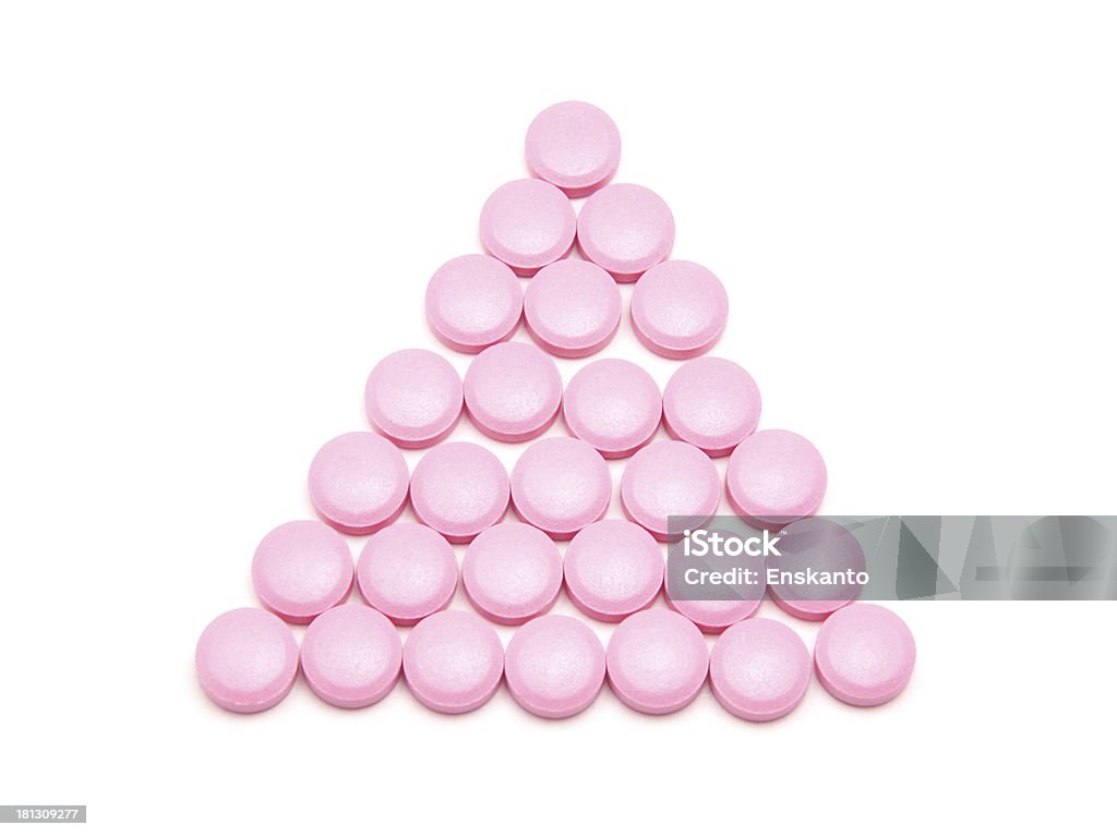 Pink tablets on a white background Antibiotic Stock Photo