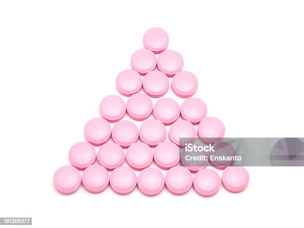 Pink Tablets On A White Background Stock Photo - Download Image Now - Antibiotic, Assistance, Capsule - Medicine